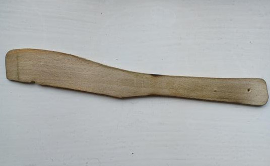 The remains of a wooden spatula, damaged by an over-enthusiastic doggy on the other side of a letterbox.